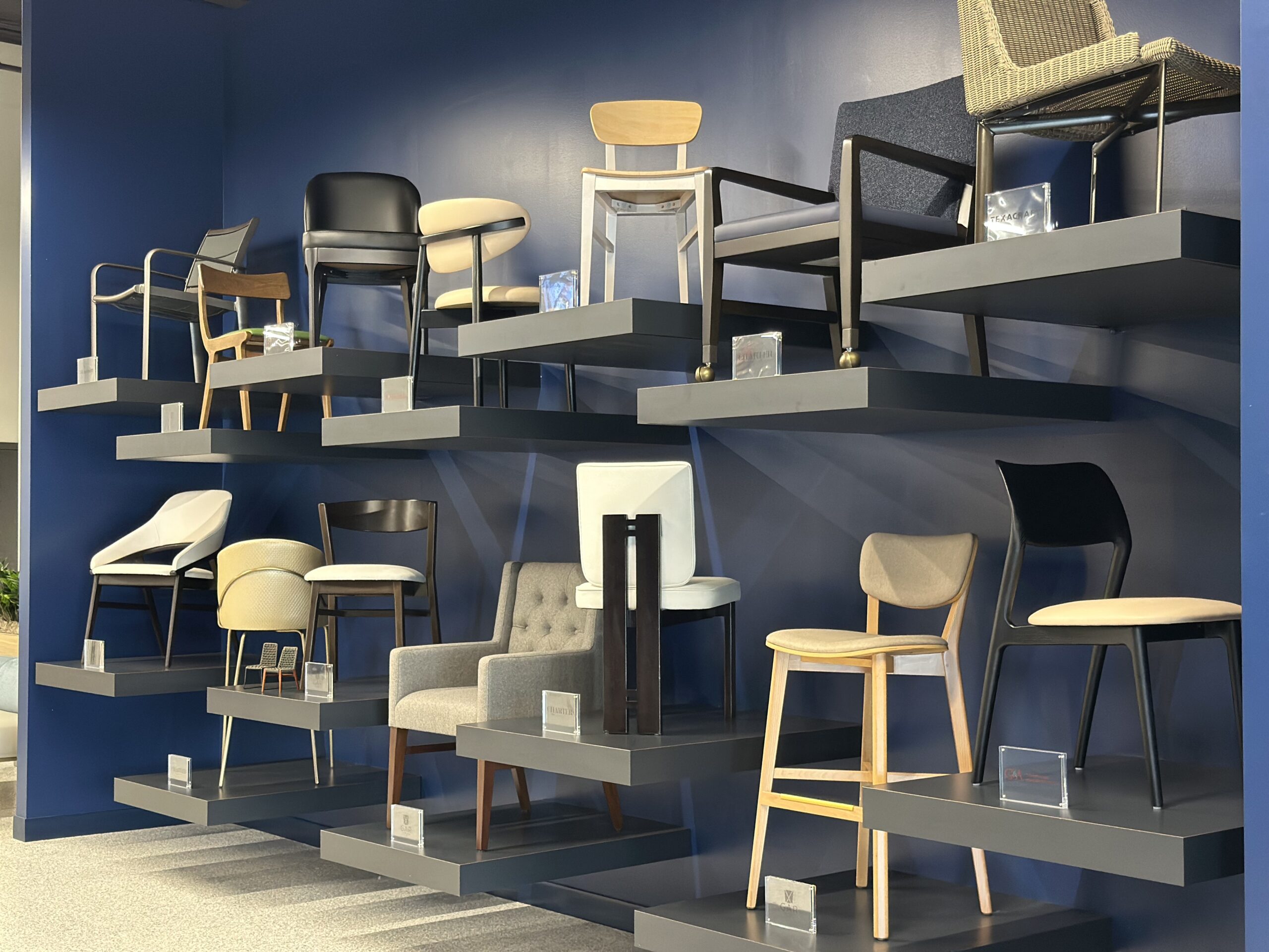 Columbus showroom displaying multi-colored tables and chairs from different premier brands